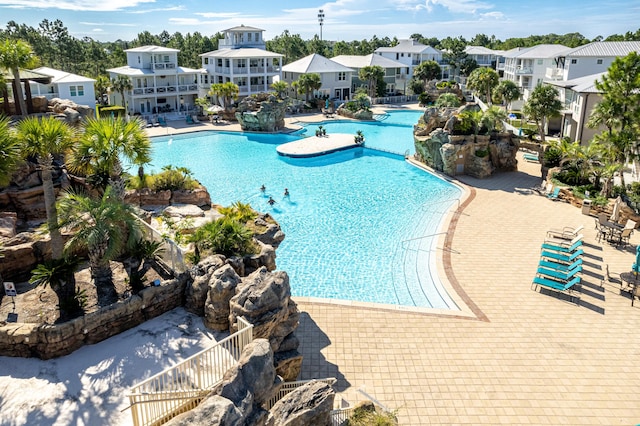 community pool with a patio