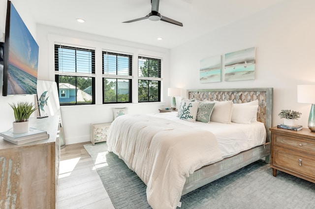 bedroom with ceiling fan, baseboards, wood finished floors, and recessed lighting