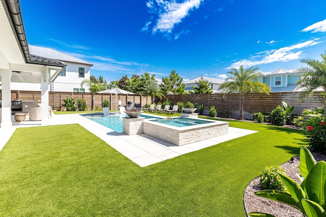 view of pool featuring a fenced in pool, a lawn, area for grilling, a fenced backyard, and a patio area