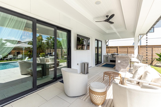 view of patio / terrace featuring an outdoor hangout area, outdoor dining space, a ceiling fan, and a fenced in pool