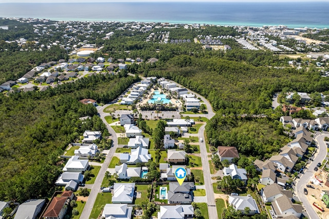 bird's eye view featuring a water view and a residential view