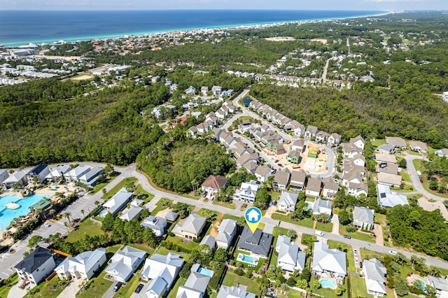 birds eye view of property featuring a water view and a residential view