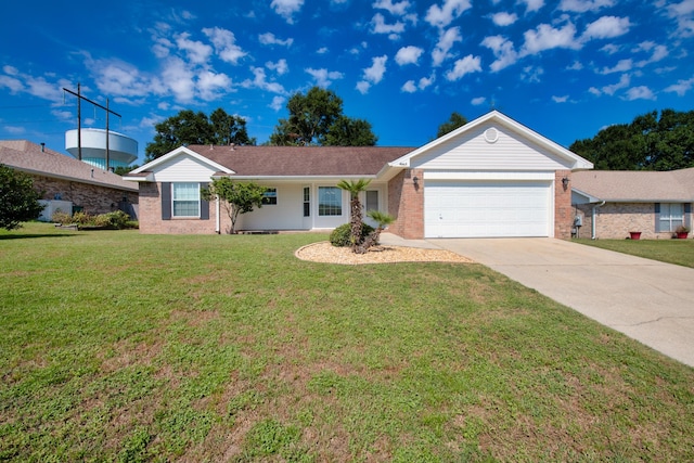 ranch-style home featuring a front lawn and a garage