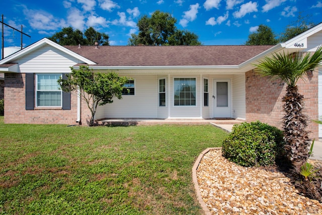 ranch-style house with a front yard