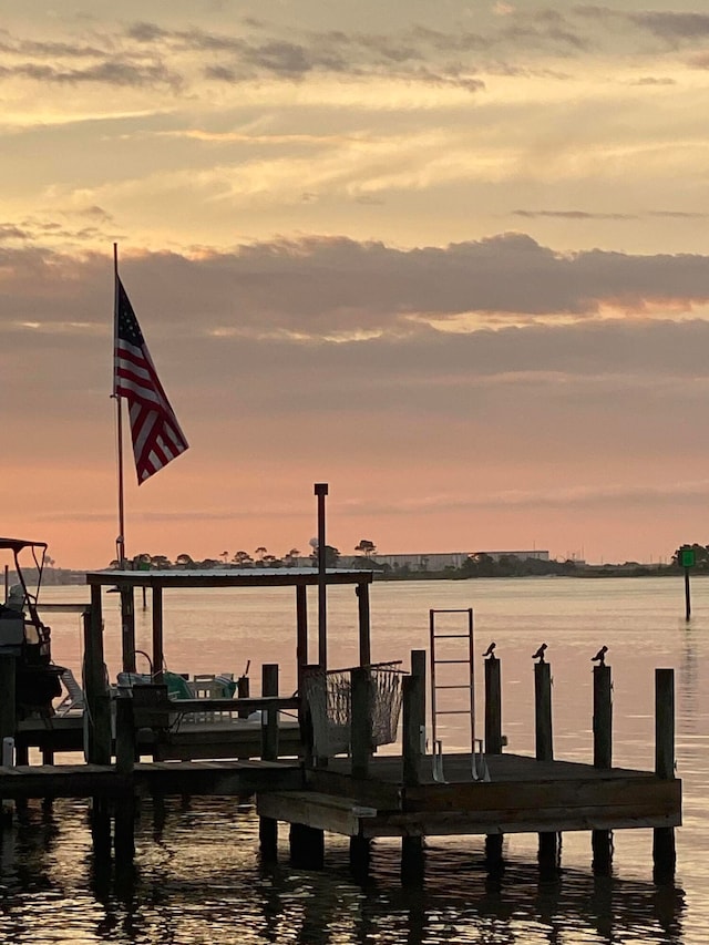 view of dock with a water view