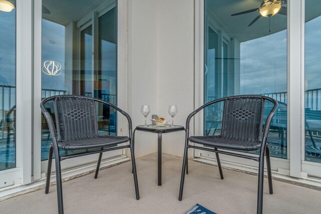 balcony featuring ceiling fan