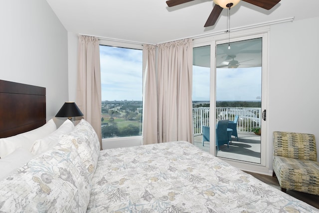 bedroom with access to exterior and a ceiling fan