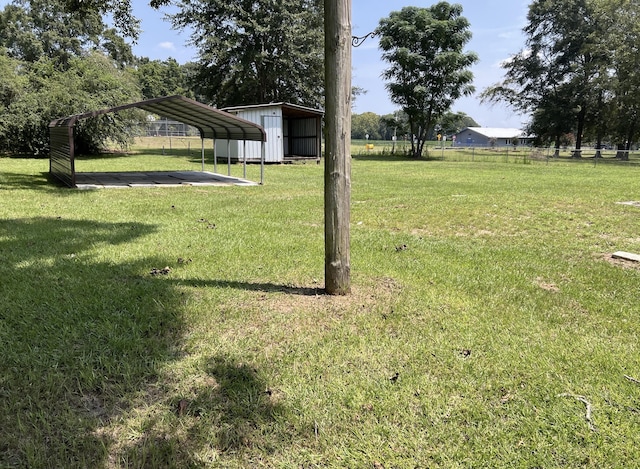 3317 N 1st Ave, Bonifay, FL 32425 - view of yard with a carport and fence