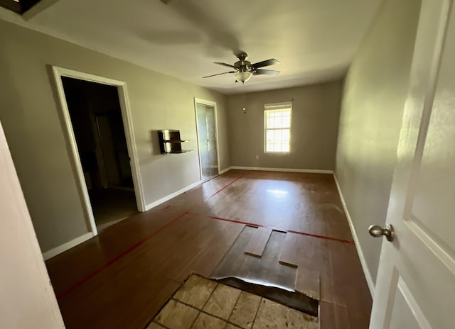3317 N 1st Ave, Bonifay, FL 32425 - unfurnished room featuring ceiling fan, baseboards, and wood finished floors
