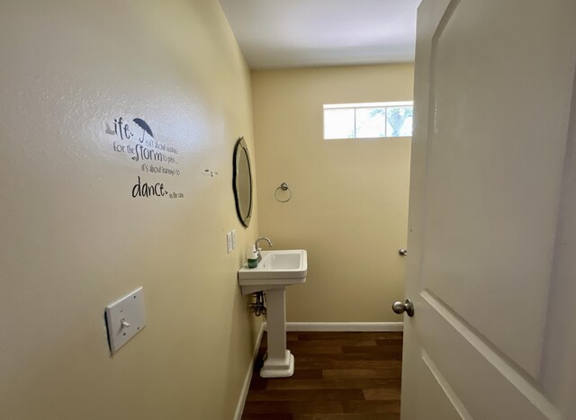 3317 N 1st Ave, Bonifay, FL 32425 - bathroom with baseboards and wood finished floors