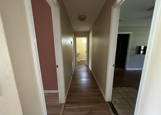 3317 N 1st Ave, Bonifay, FL 32425 - hall featuring light wood-type flooring and baseboards