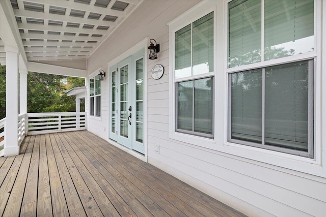 wooden terrace featuring french doors