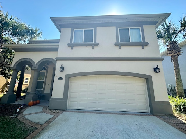 view of front of property with a garage