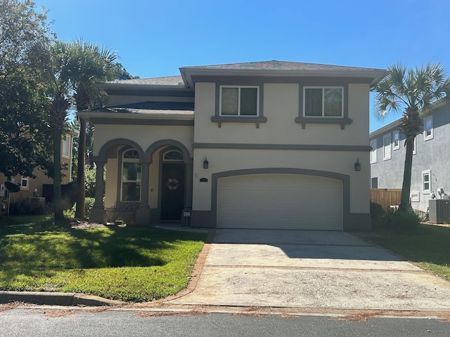 view of front facade with a garage, central AC unit, and a front lawn