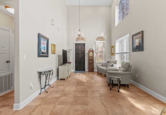 entryway with a high ceiling