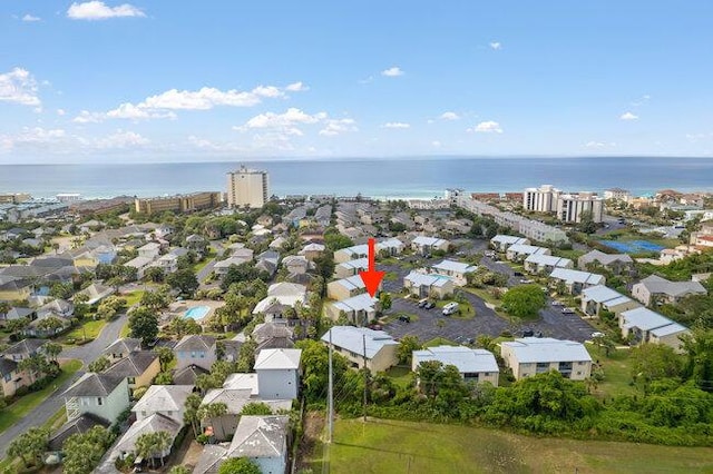 drone / aerial view with a water view