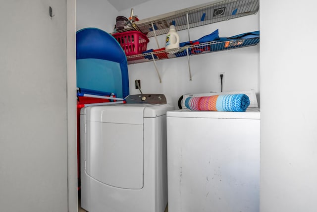 laundry area featuring laundry area and washer and dryer