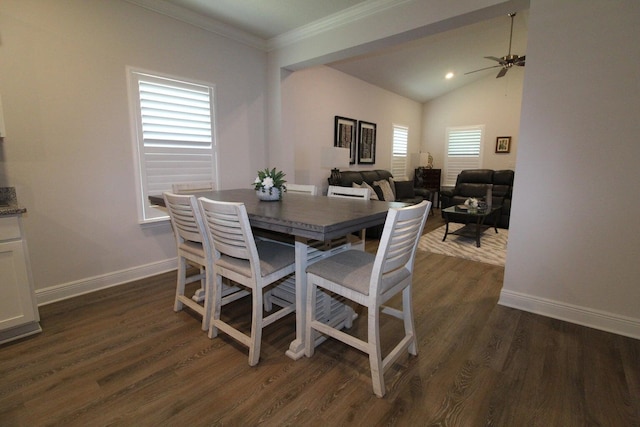 dining room featuring lofted ceiling, ceiling fan, and dark hardwood / wood-style floors