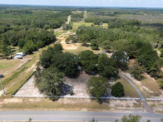 aerial view featuring a view of trees