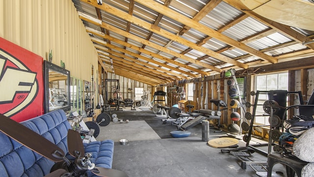 gym with vaulted ceiling