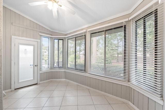 unfurnished sunroom with lofted ceiling and ceiling fan