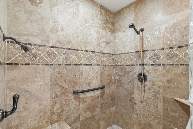 details featuring a tile shower