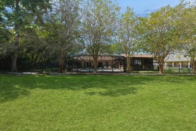 view of yard featuring a lanai