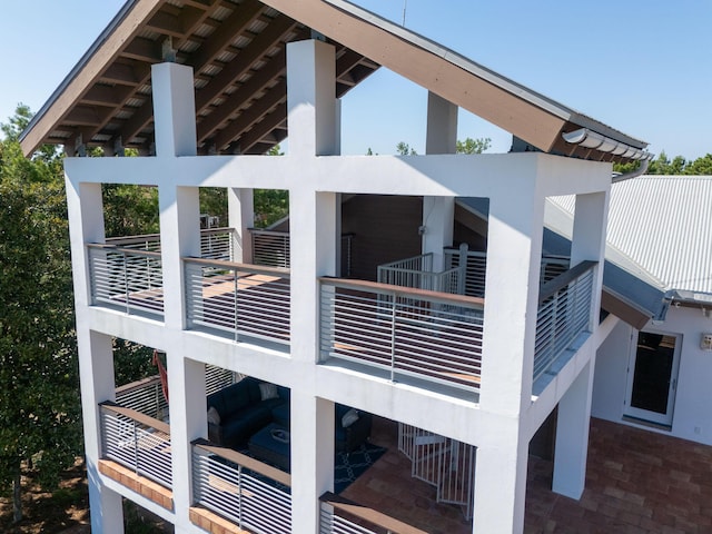 view of property exterior featuring metal roof