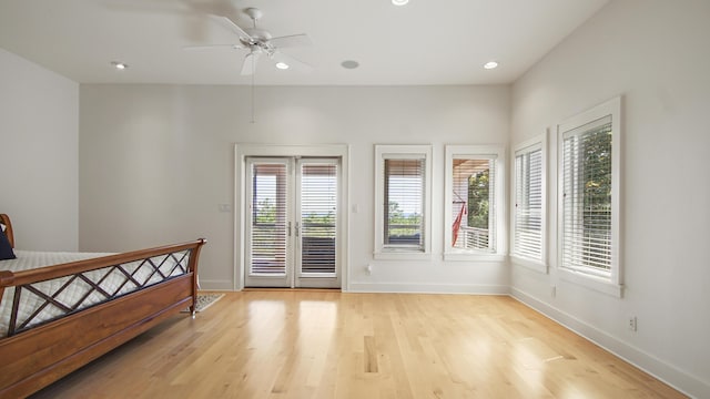 bedroom with access to exterior, recessed lighting, ceiling fan, light wood-type flooring, and baseboards