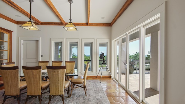 unfurnished sunroom with beamed ceiling and french doors