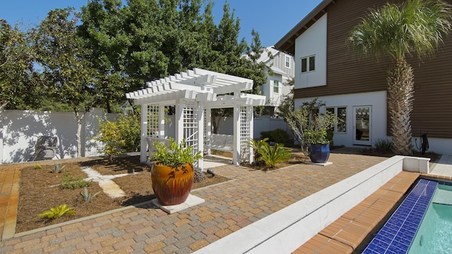 exterior space with a fenced backyard, a patio area, an outdoor pool, a pergola, and stucco siding