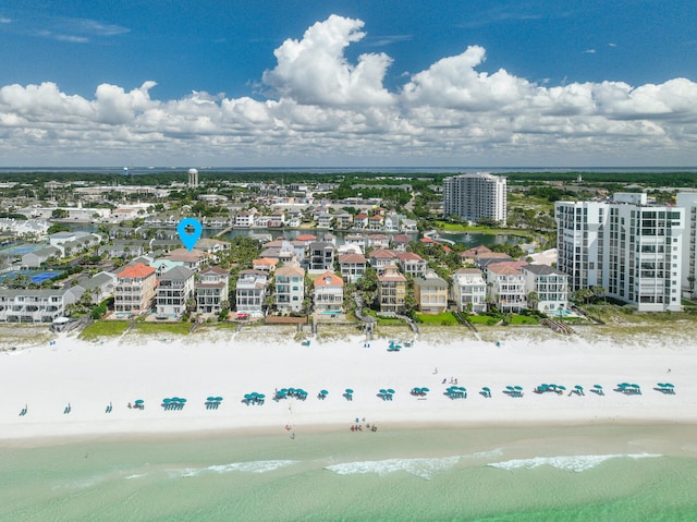 drone / aerial view with a view of the beach and a water view