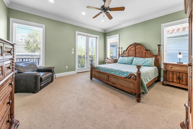 bedroom with multiple windows, ceiling fan, and carpet flooring