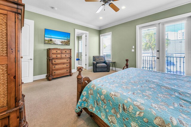 carpeted bedroom with ceiling fan, access to outside, crown molding, and french doors