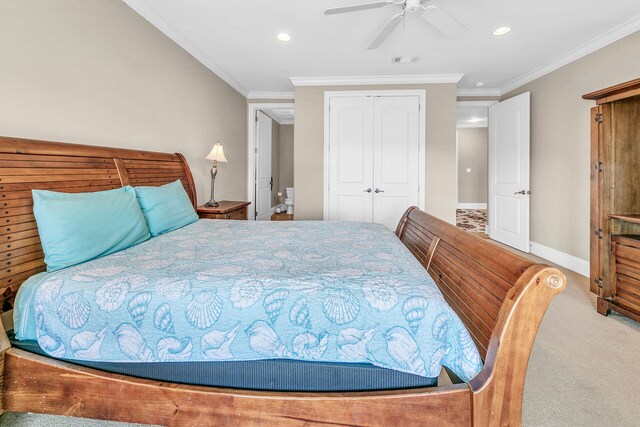 bedroom featuring ornamental molding, a closet, ceiling fan, and carpet floors