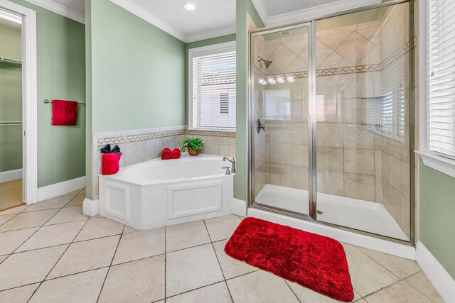 bathroom with independent shower and bath, ornamental molding, and tile patterned floors