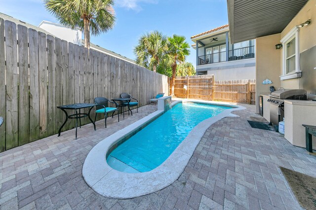 view of swimming pool featuring a patio area