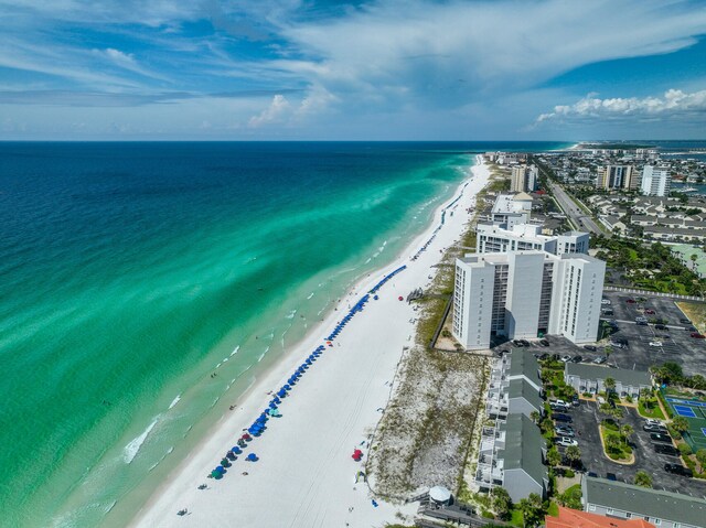 drone / aerial view with a view of the beach and a water view