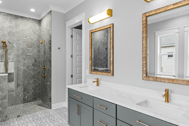 bathroom with vanity, tile patterned floors, an enclosed shower, and ornamental molding