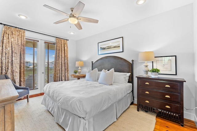 bedroom with ceiling fan, light wood-type flooring, and access to outside