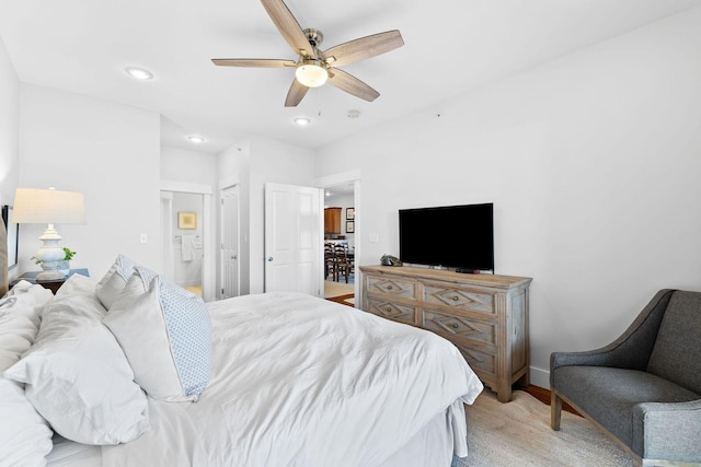 bedroom featuring ceiling fan and light hardwood / wood-style floors