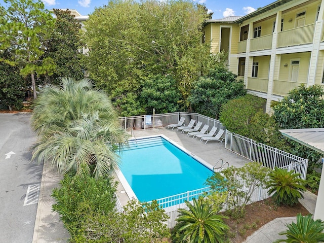 view of swimming pool with a patio