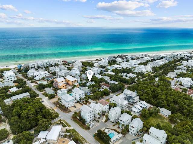 aerial view featuring a water view and a beach view