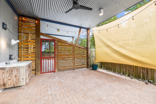 view of patio / terrace with ceiling fan