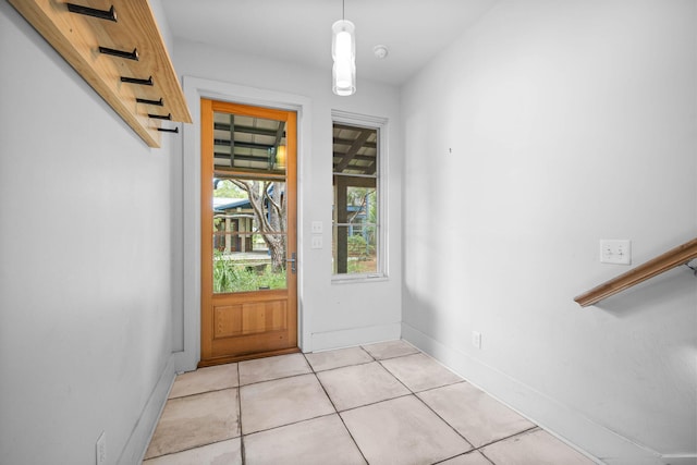 doorway featuring light tile patterned floors