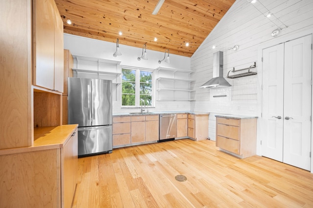 kitchen with wooden ceiling, appliances with stainless steel finishes, sink, light brown cabinets, and wall chimney range hood