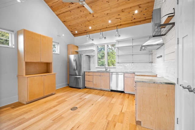 kitchen with stainless steel appliances, plenty of natural light, ceiling fan, high vaulted ceiling, and tasteful backsplash