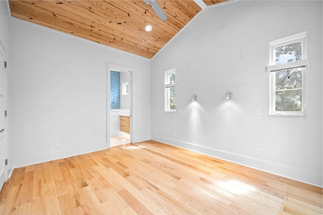 empty room with ceiling fan, high vaulted ceiling, wooden ceiling, and light hardwood / wood-style floors