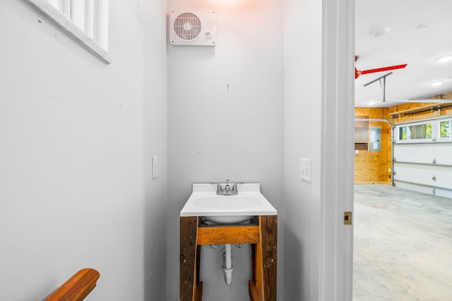 bathroom with concrete floors and sink