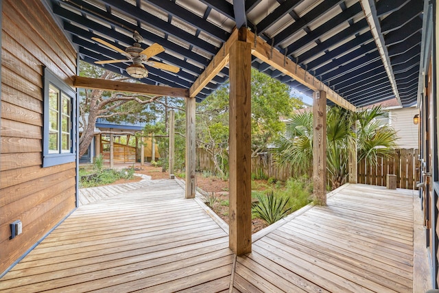 wooden terrace featuring ceiling fan